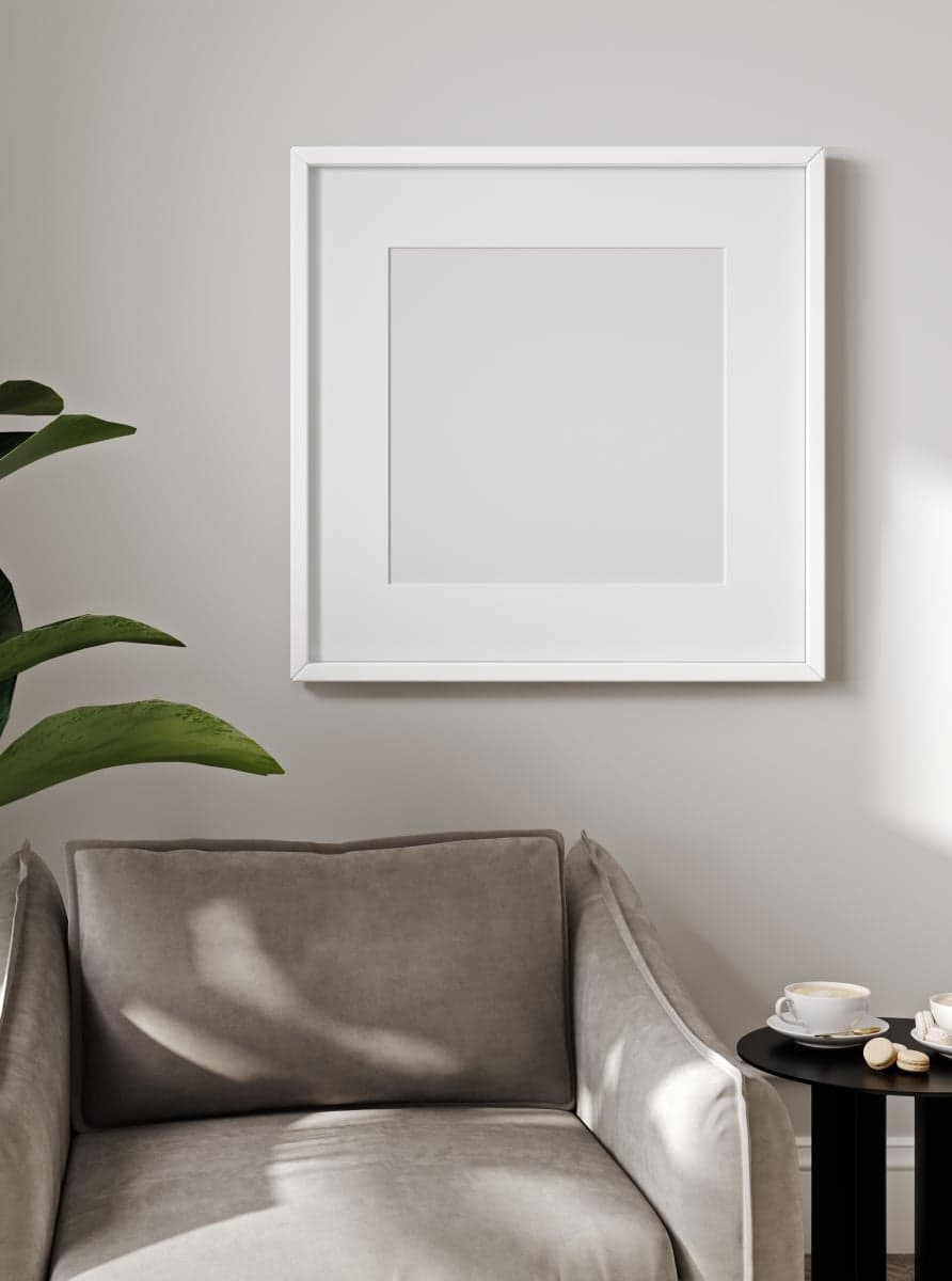 Framed artwork and armchair